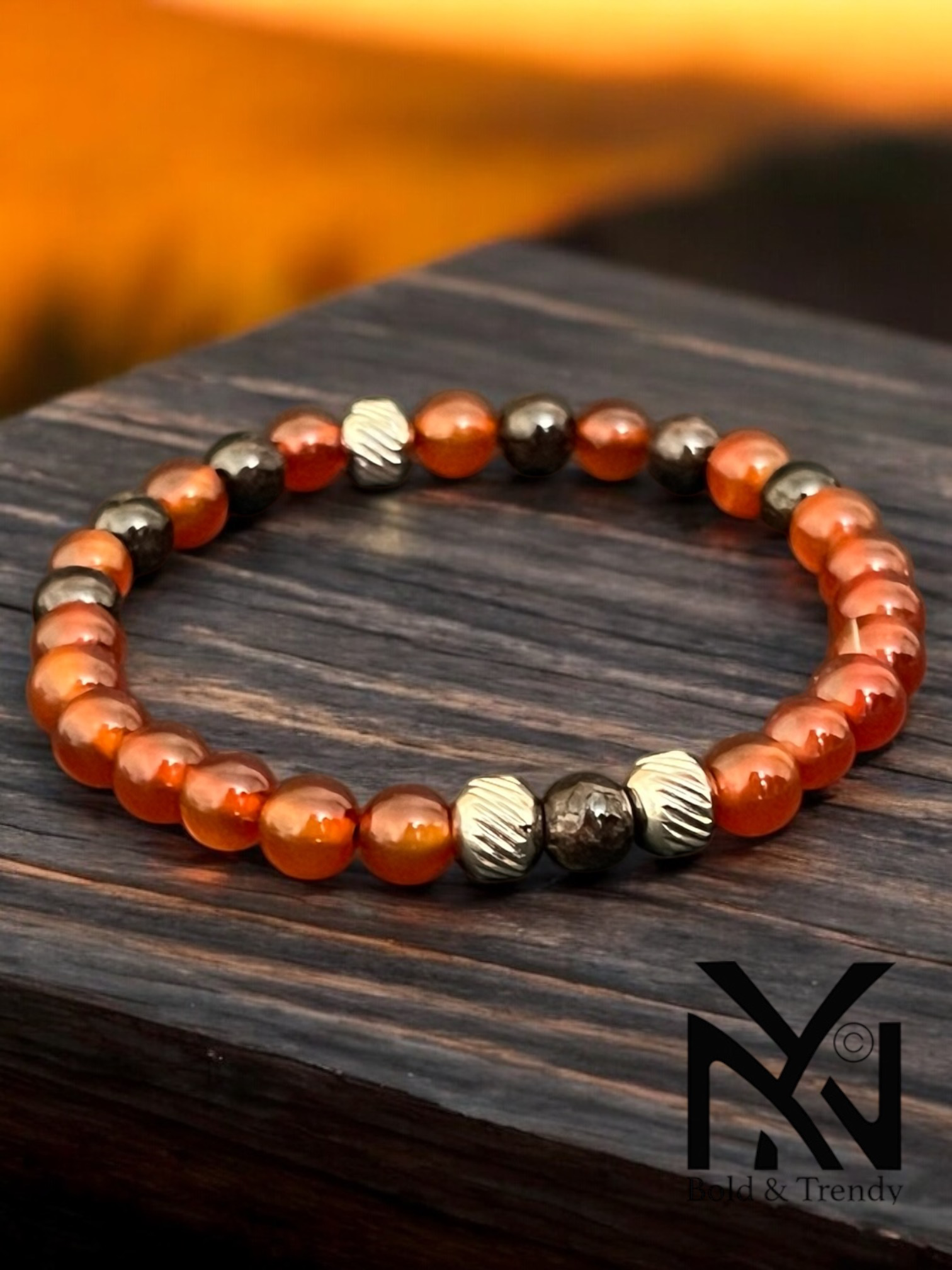 Ciel de Minuit bracelet showcasing orange jade and black onyx stones for emotional clarity and grounding